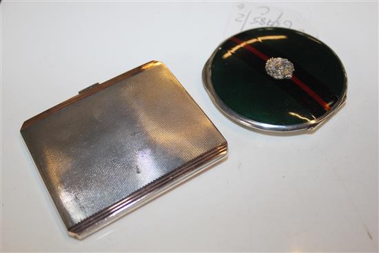 A 1930s engine turned silver and enamel circular compact & a cigarette case.(-)
